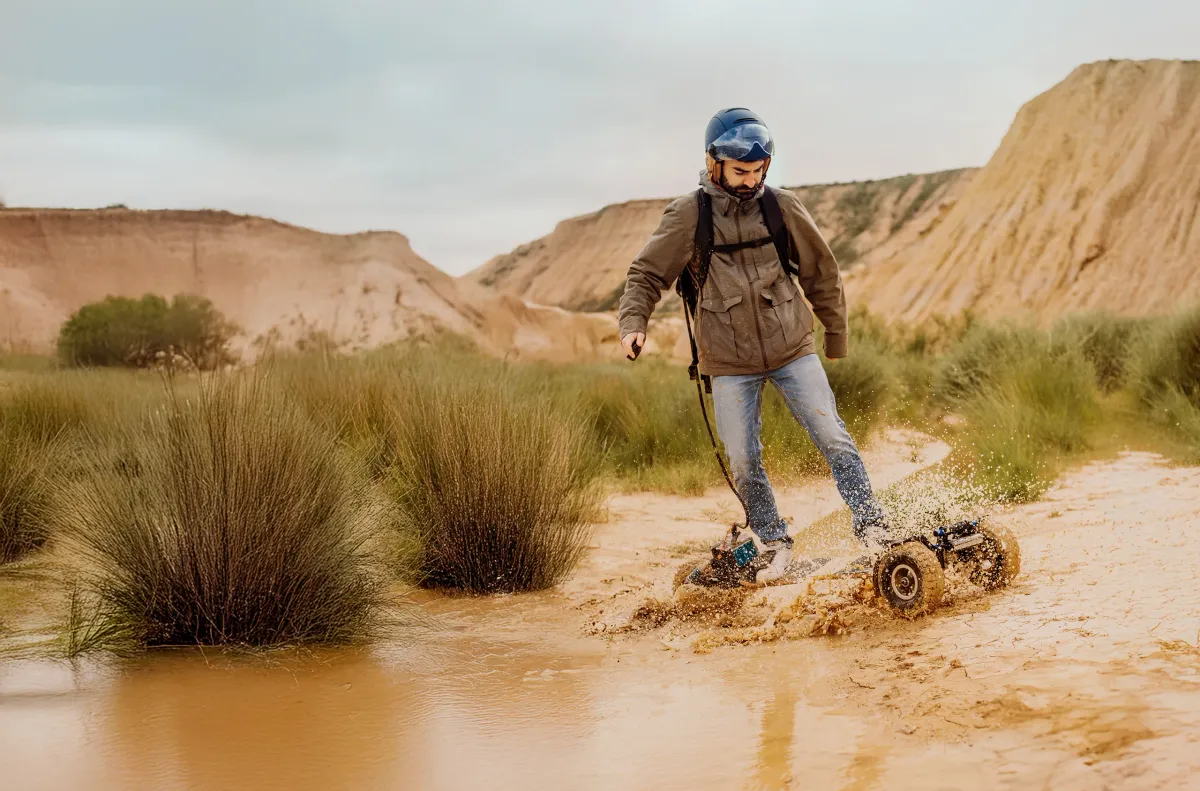 Rider on a Stern' in the desert, going through a muddy puddle