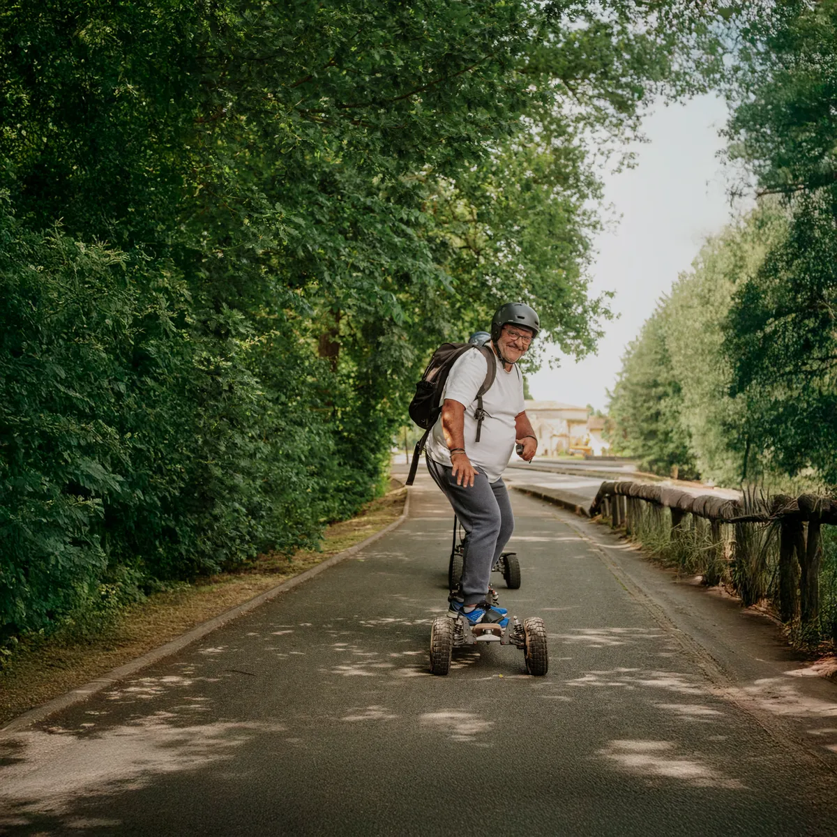 Rider on a Stern' on a narrow tree-lined road