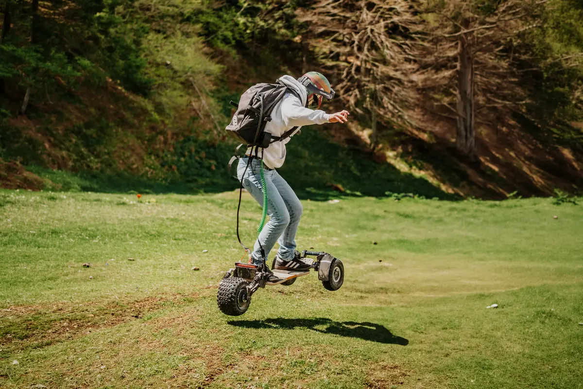 Rider lifting the front of their Stern' in a mountain meadow