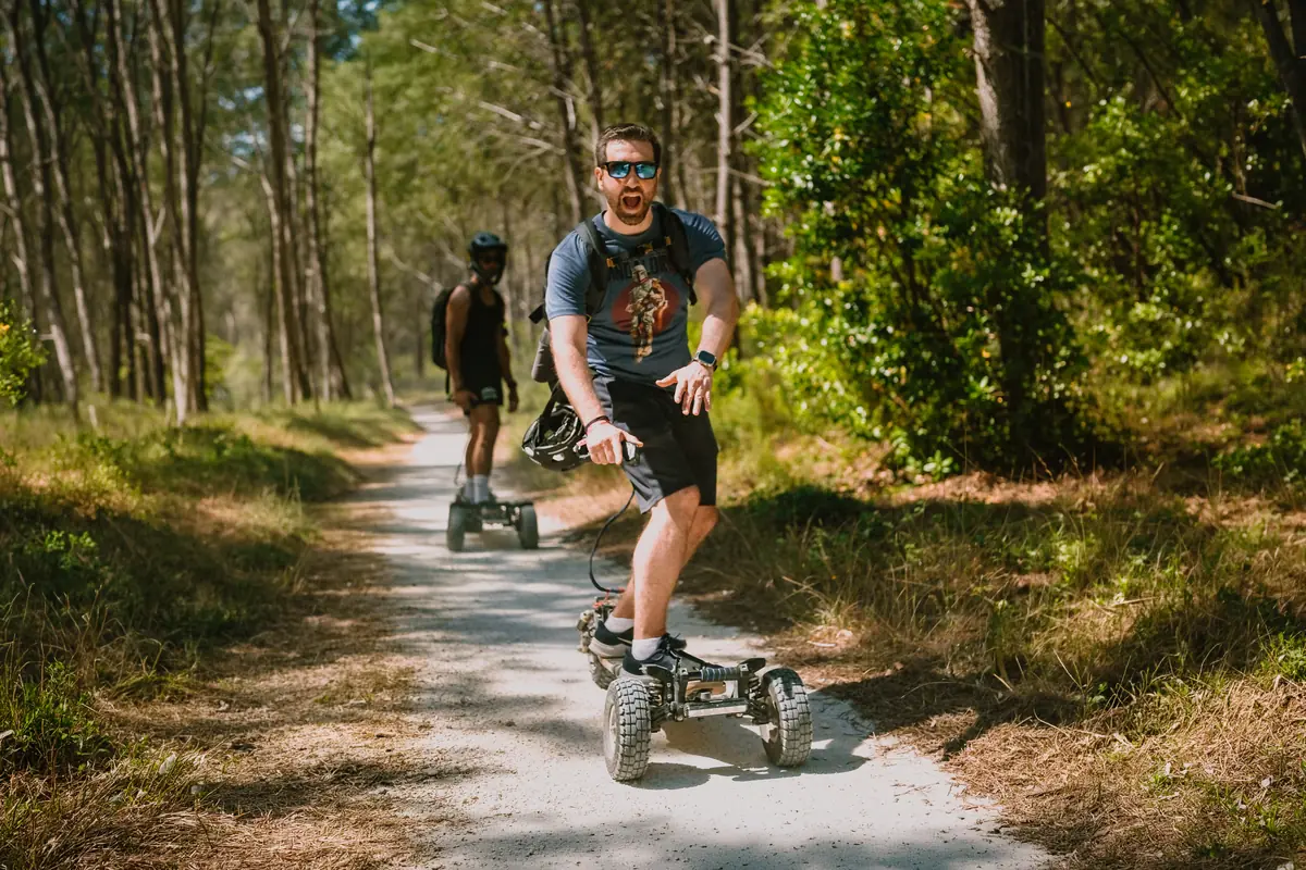 Geoffroy on his Stern' on a forest track, another rider behind him