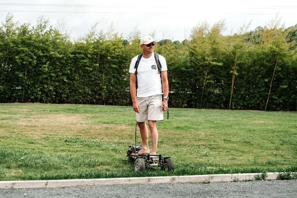 Jacques-Pierre, professional, standing on a Stern' on a lawn
